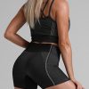 Sophisticated Black Seamless Cropped Athletic Suit Cut Out All Over Smooth